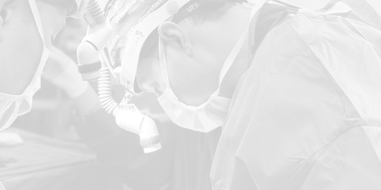 Surgeons performing a procedure in operation room.