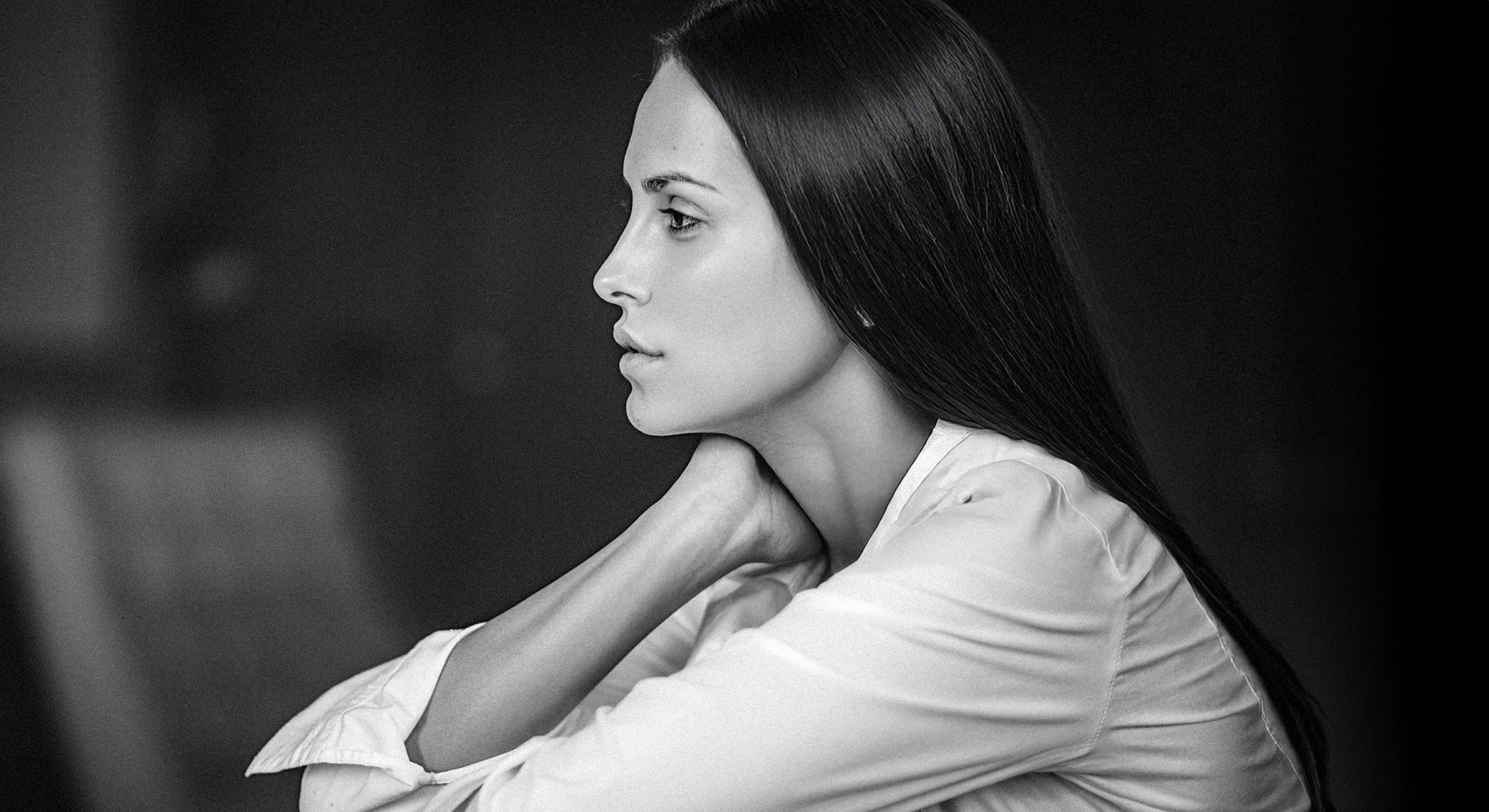 Profile of a woman in black and white.